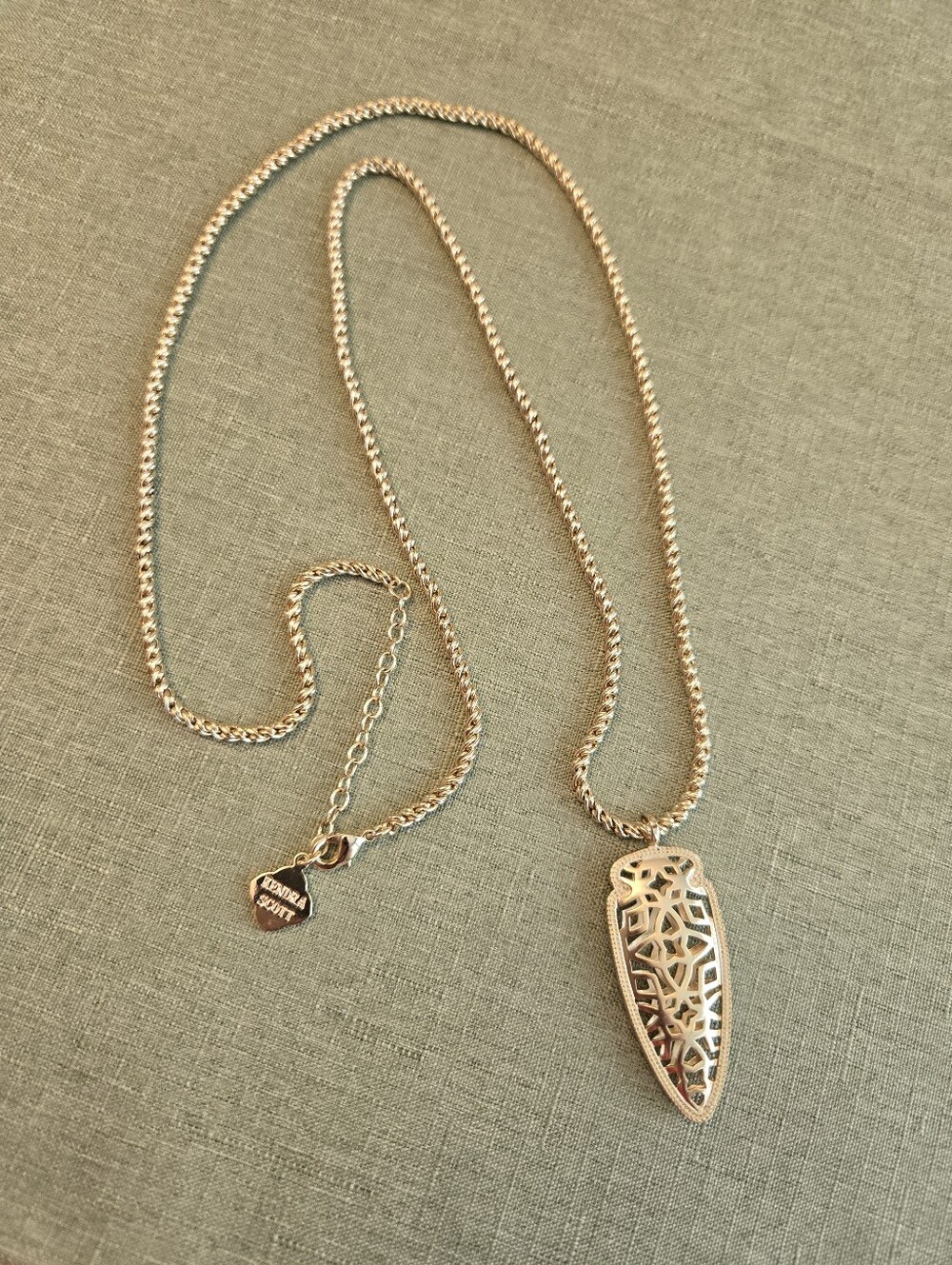 Kendra, Scott Sienna Arrowhead long pendant gold tone filigree